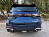 Rent Geely Okavango
